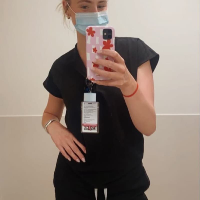 Nursing student reviewing TEAS practice questions on a laptop